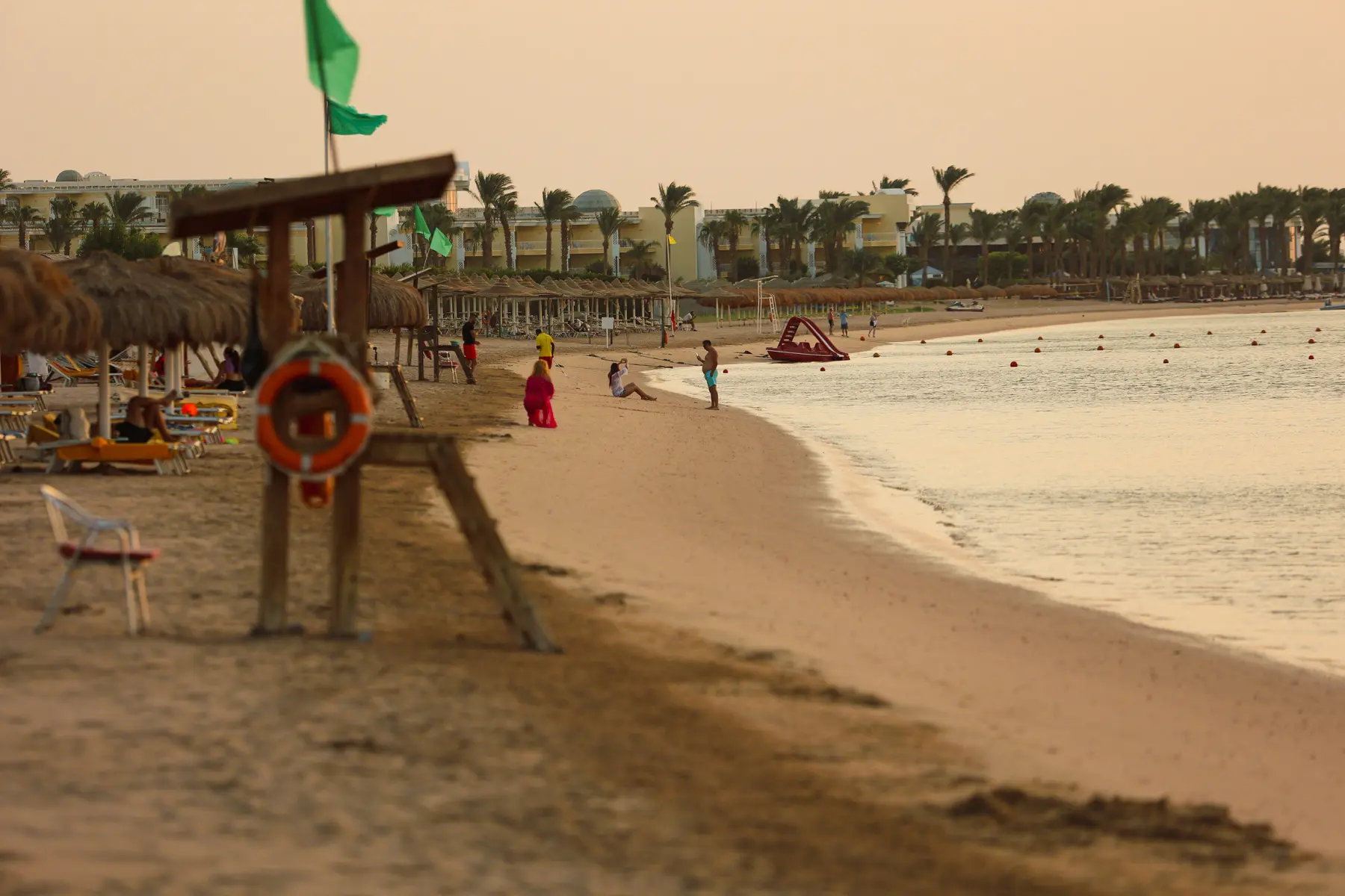 Private beach with sun umbrellas along the Red Sea at Caribbean World Resorts Hurghada photographed by VirtuPeek