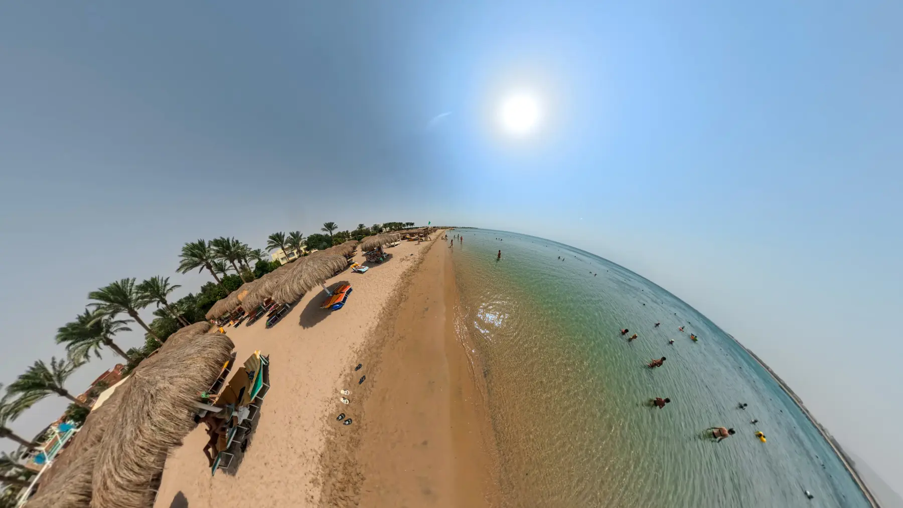 Wide beach view along the Red Sea shoreline at Caribbean World Resorts Hurghada photographed by VirtuPeek