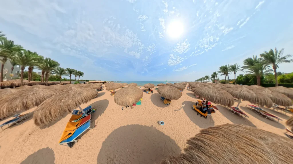 Beach umbrella relaxation area at Caribbean World Resorts Hurghada on the Red Sea coast photographed