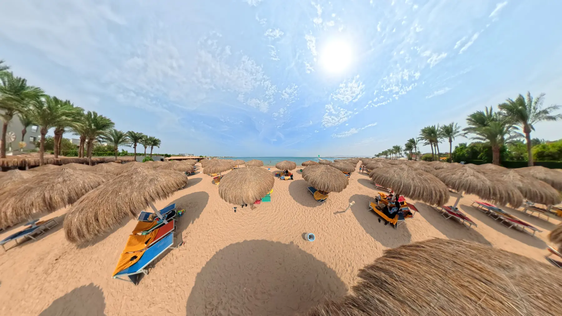 Beach umbrella relaxation area at Caribbean World Resorts Hurghada on the Red Sea coast photographed