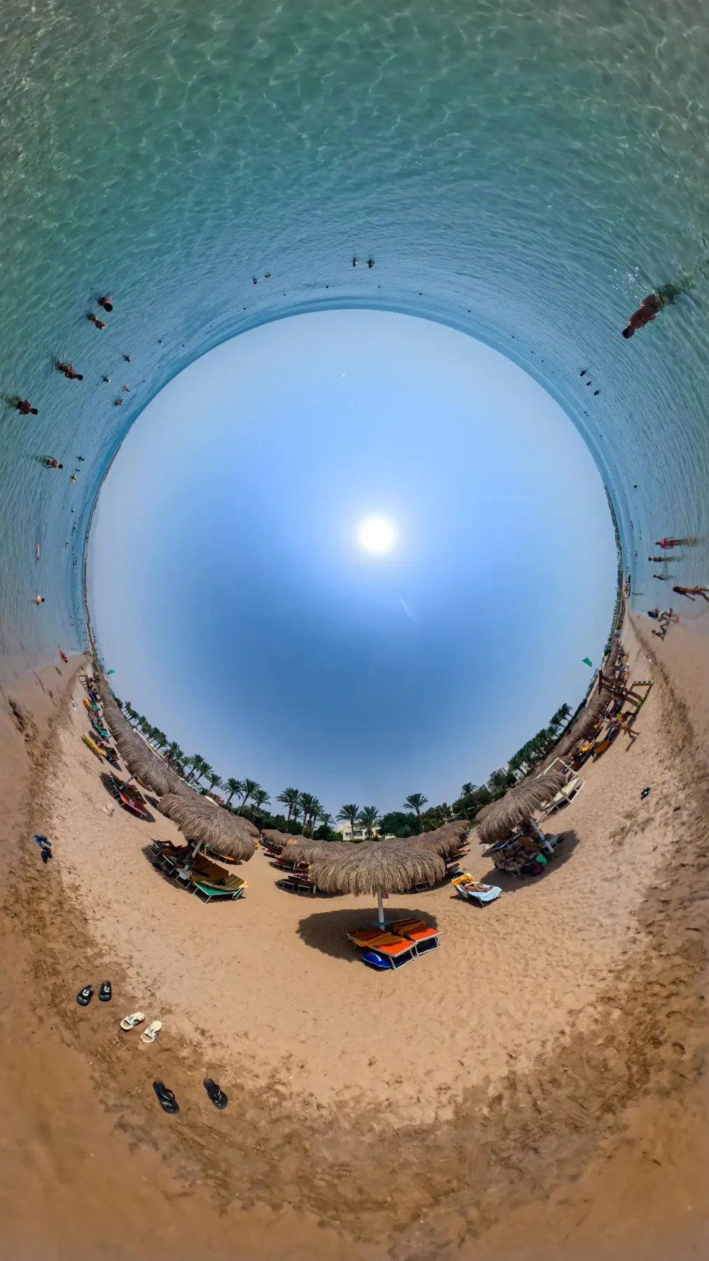 Private beach at Caribbean World Resorts Hurghada photographed by VirtuPeek in a 360 tiny planet perspective
