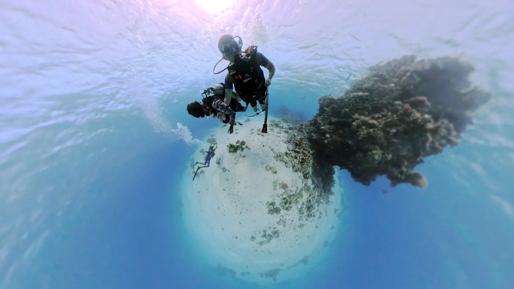 Underwater coral reef scene near Caribbean World Resorts Hurghada captured in a 360 tiny planet